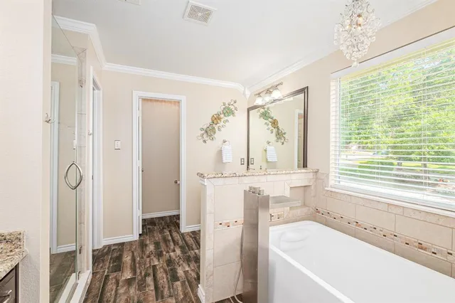 a kitchen with granite countertop a stove and a sink