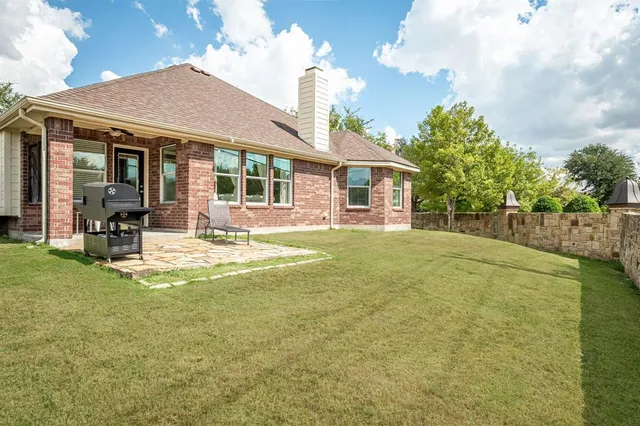 a view of a balcony with a potted plant