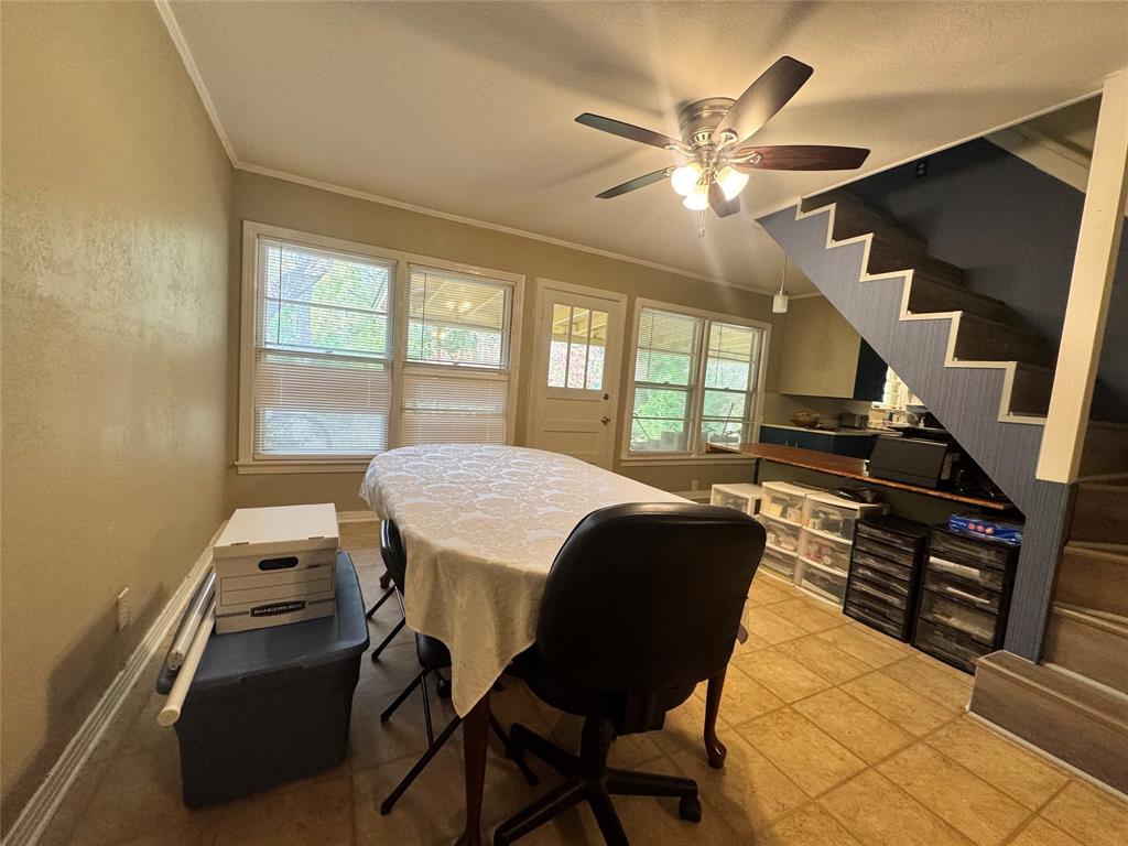 2605 West Azalea Drive Tyler, TX 75701 - Photo 12 of 25 a bedroom with a bed and wooden floor