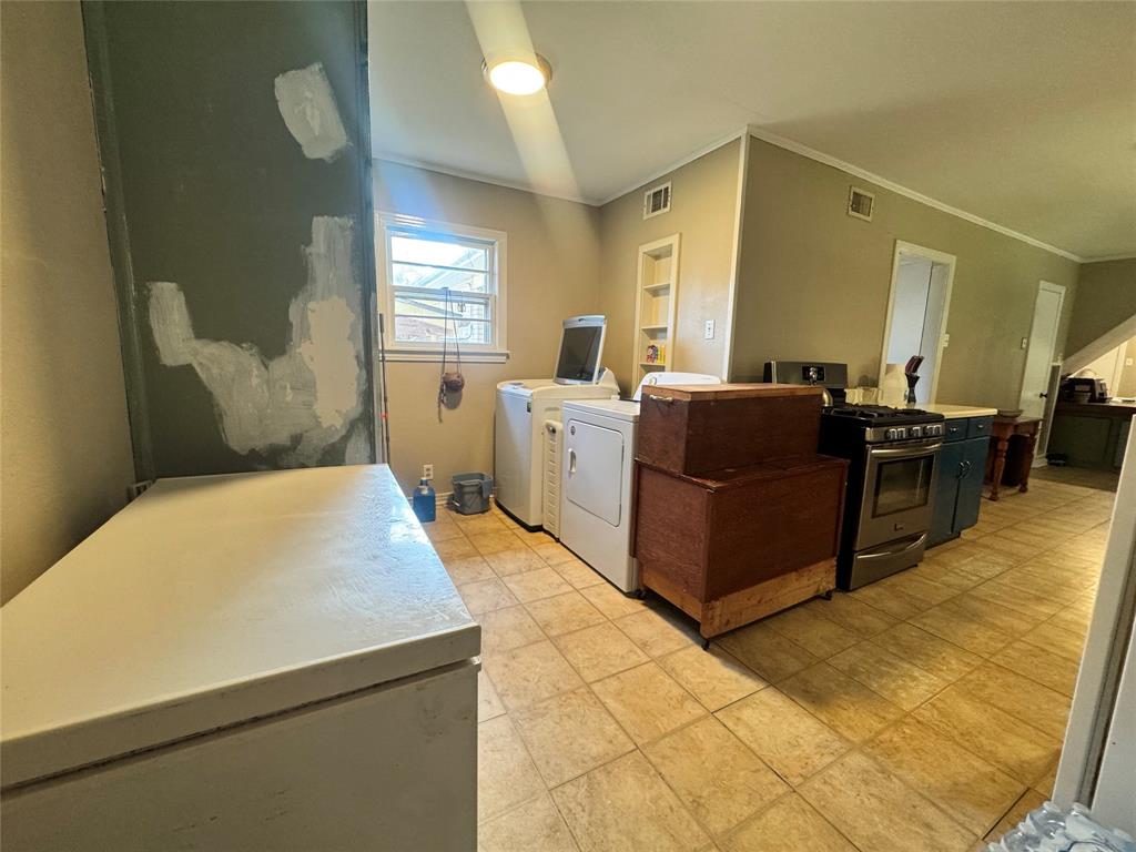 2605 West Azalea Drive Tyler, TX 75701 - Photo 14 of 25 a bed room with a bed and furniture