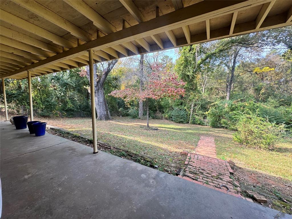 2605 West Azalea Drive Tyler, TX 75701 - Photo 20 of 25 a view of a road with porch