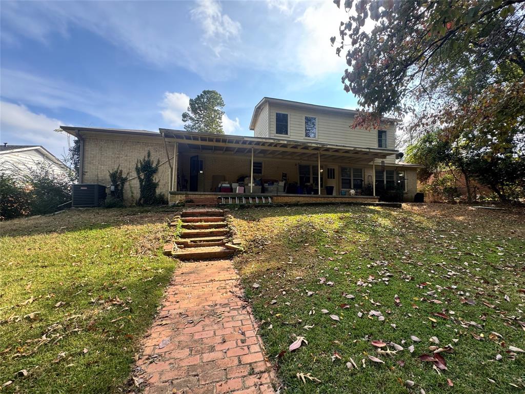 2605 West Azalea Drive Tyler, TX 75701 - Photo 21 of 25 a view of a house with swimming pool and sitting area