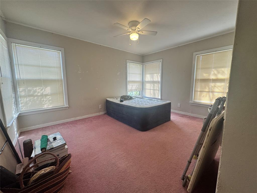 2605 West Azalea Drive Tyler, TX 75701 - Photo 8 of 25 a room with furniture and a window
