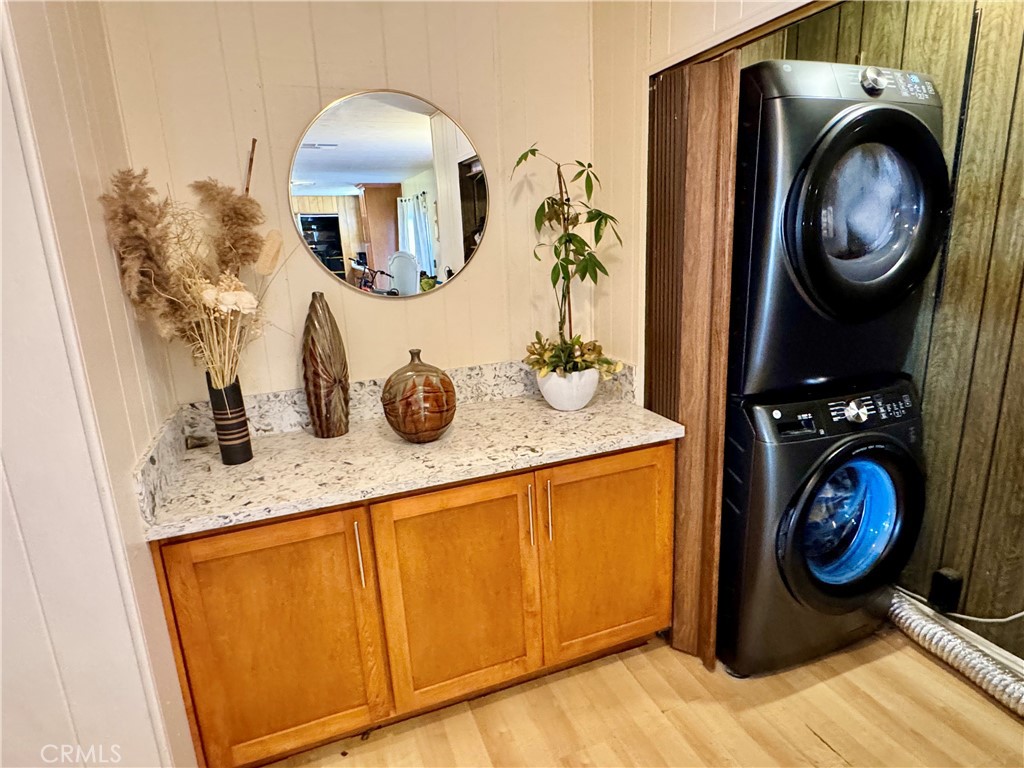 23301 Ridge Rte Drive, Unit 109 Laguna Hills, CA 92653 - Photo 33 of 46 a view of washer and dryer in a utility room