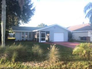a view of house with garden