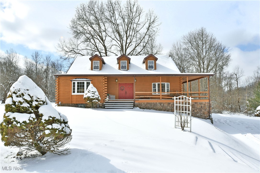 3339 Bushnell Campbell Road Fowler, OH 44418 - Photo 1 of 50 Log cabin featuring covered porch and log siding