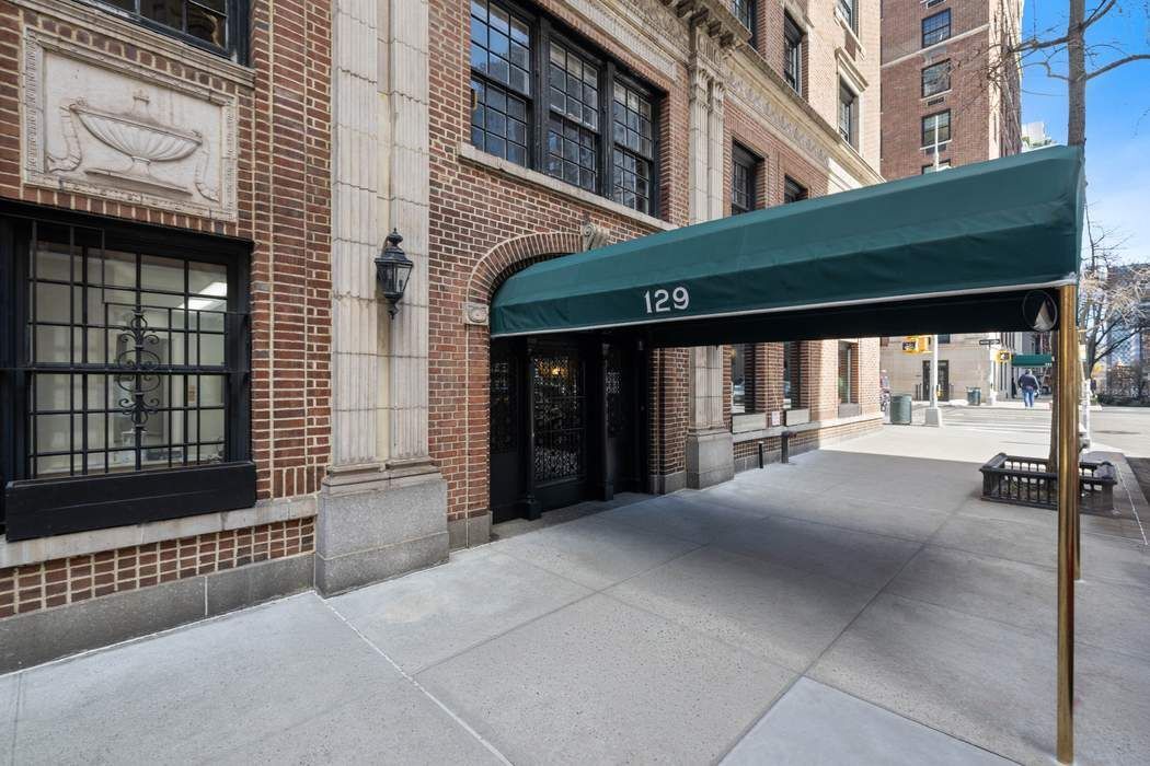 129 East 69th Street, Unit 2/3A Manhattan, NY 10021 - Photo 11 of 12 a view of a building with a large window