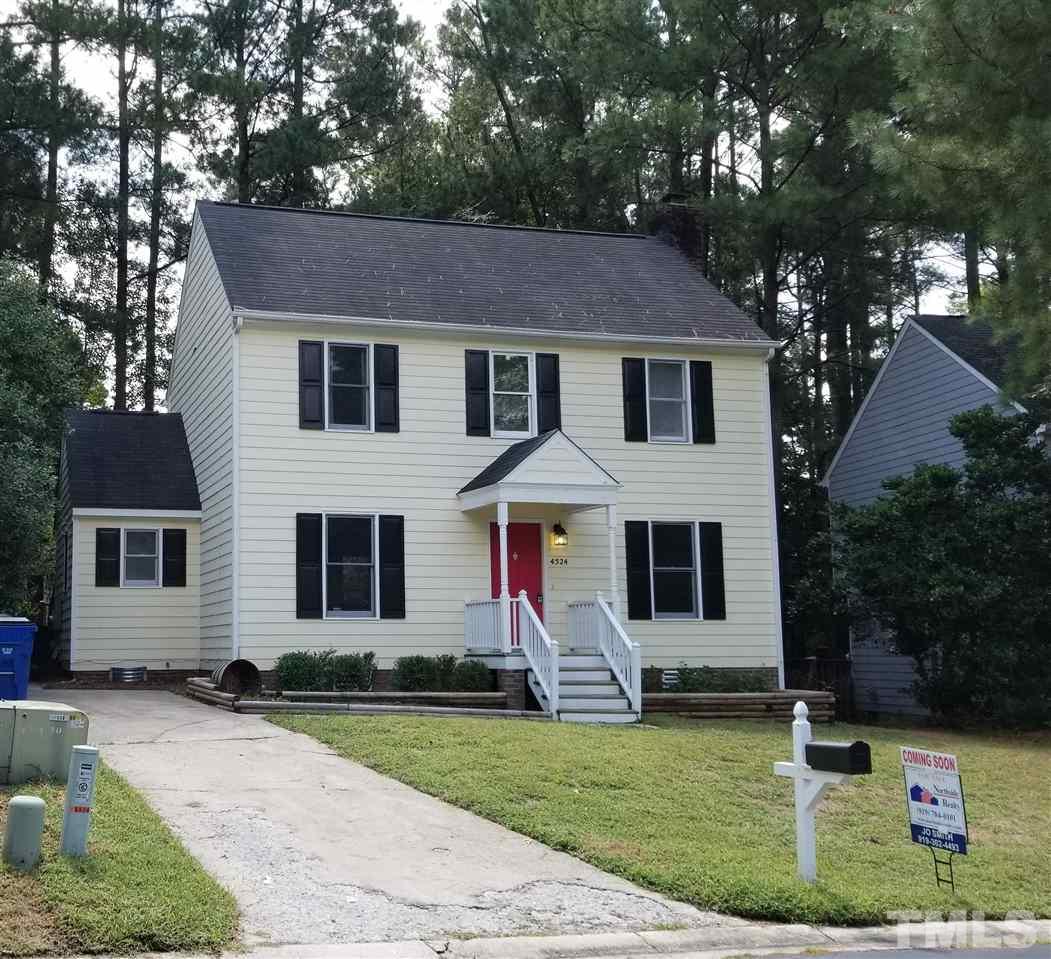 4524 Draper Road Raleigh, NC 27616 - Photo 1 of 20 a front view of a house with a yard