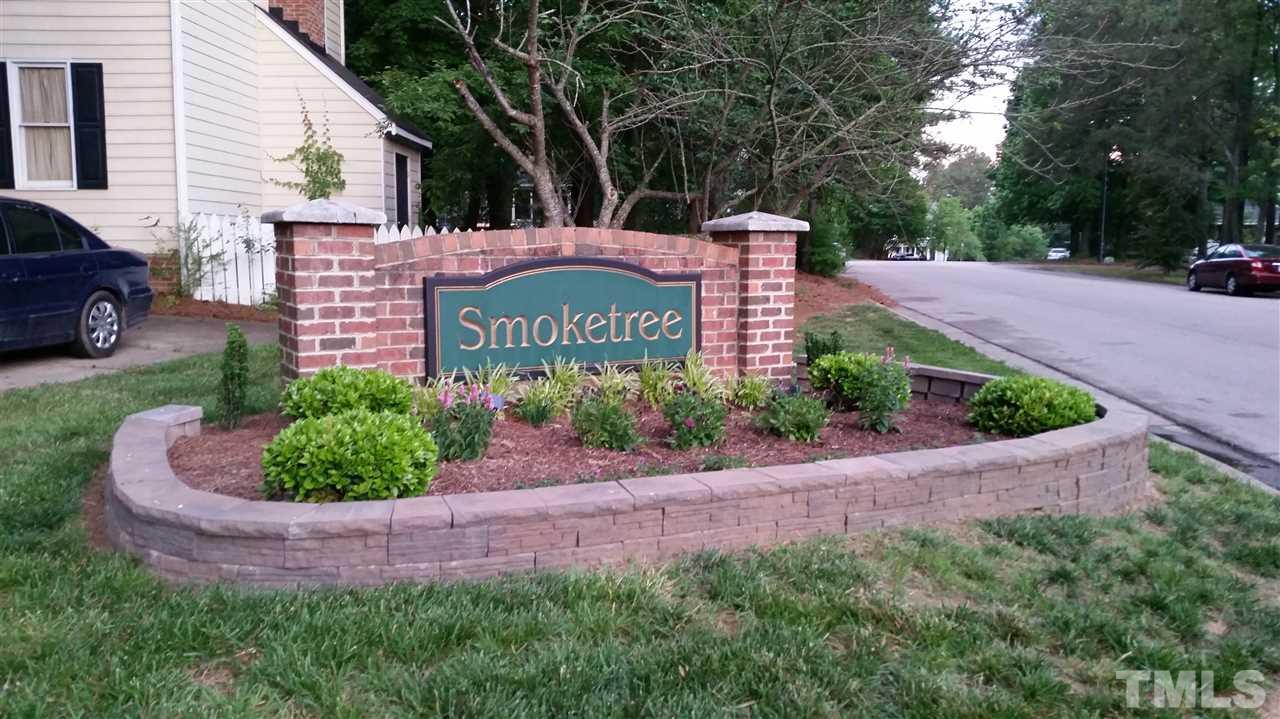 4524 Draper Road Raleigh, NC 27616 - Photo 20 of 20 a sign that is sitting in front of flowers