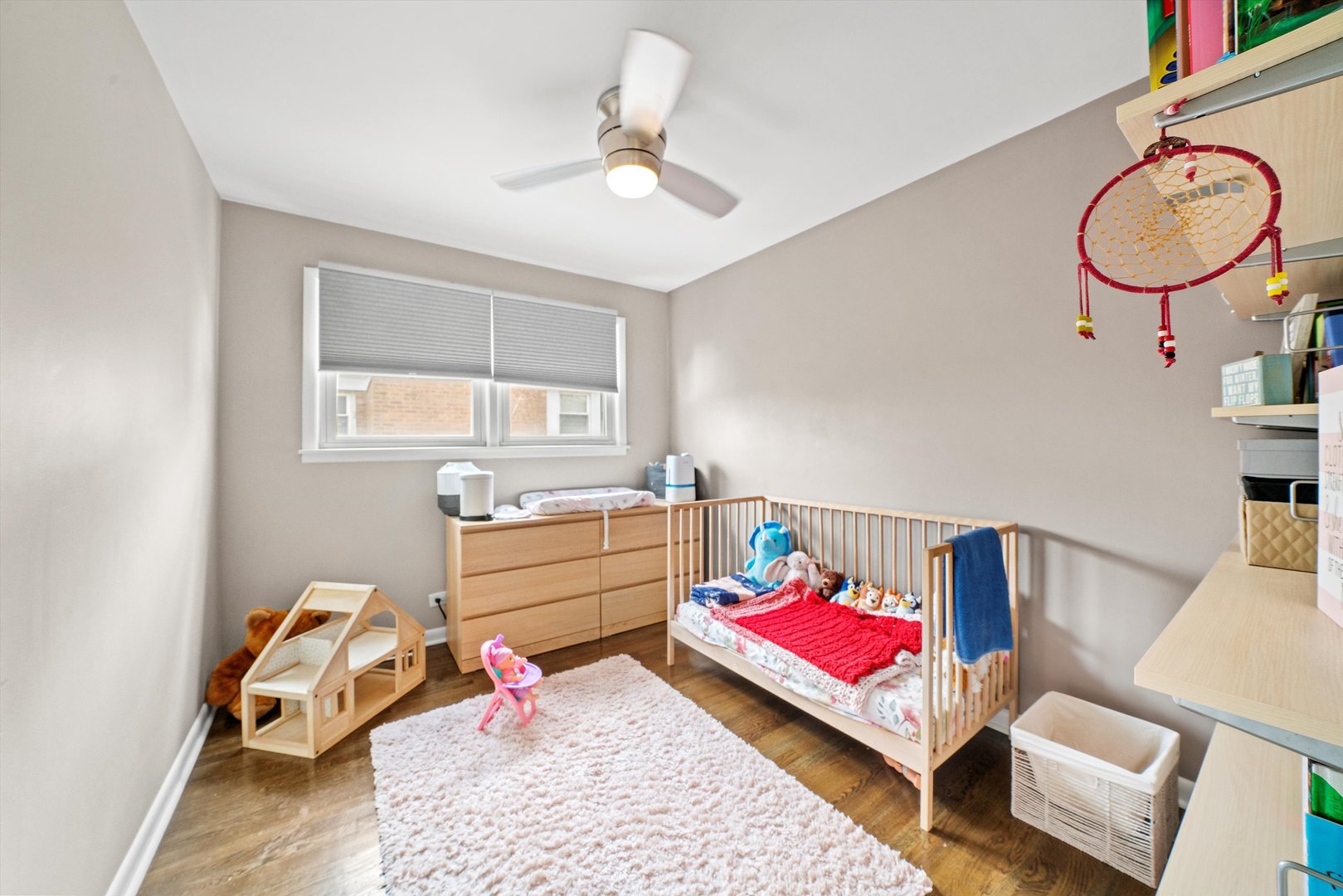 8819 North Wisner Street, Unit 2 Niles, IL 60714 - Photo 11 of 22 a bedroom with furniture and a window