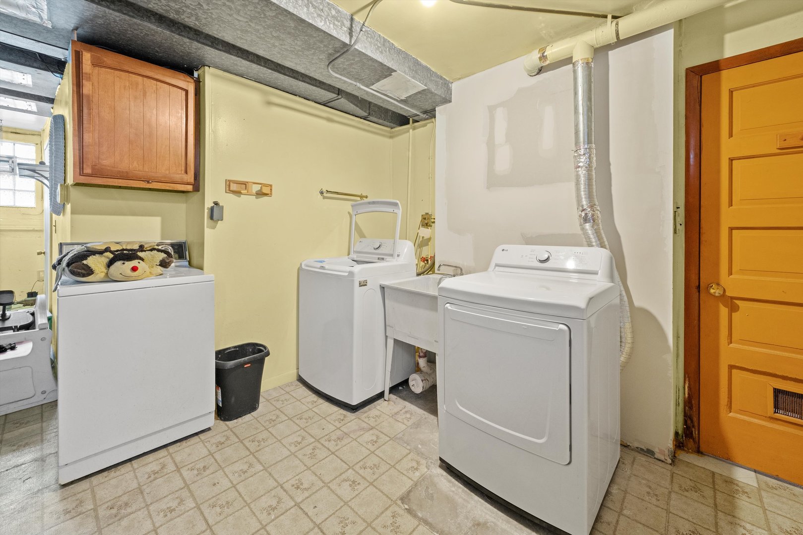 8819 North Wisner Street, Unit 2 Niles, IL 60714 - Photo 16 of 22 a utility room with dryer and washer