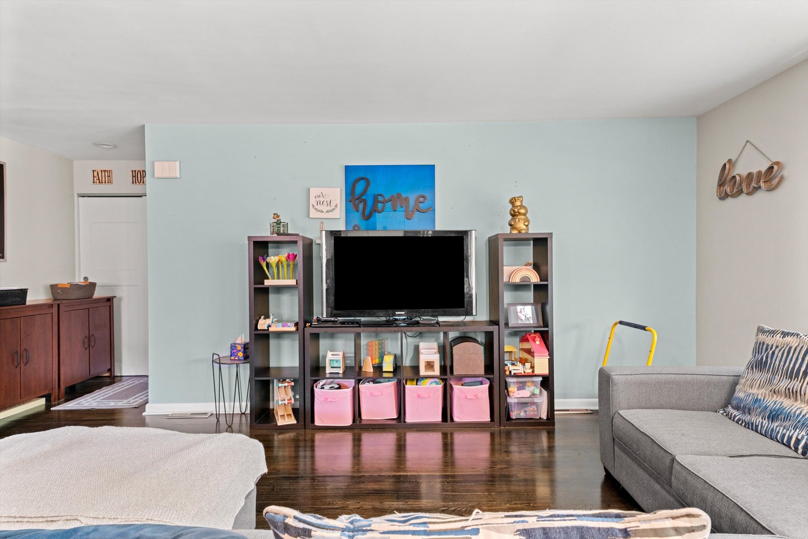 8819 North Wisner Street, Unit 2 Niles, IL 60714 - Photo 9 of 22 a living room with furniture and a flat screen tv