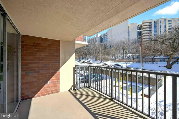 a view of balcony with a potted plant
