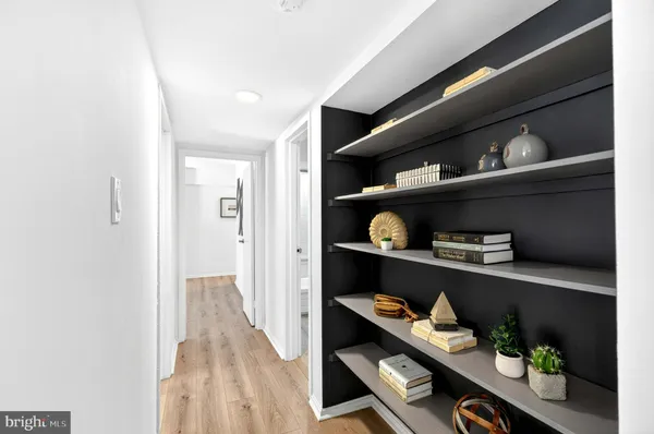 a view of workspace with wooden floor
