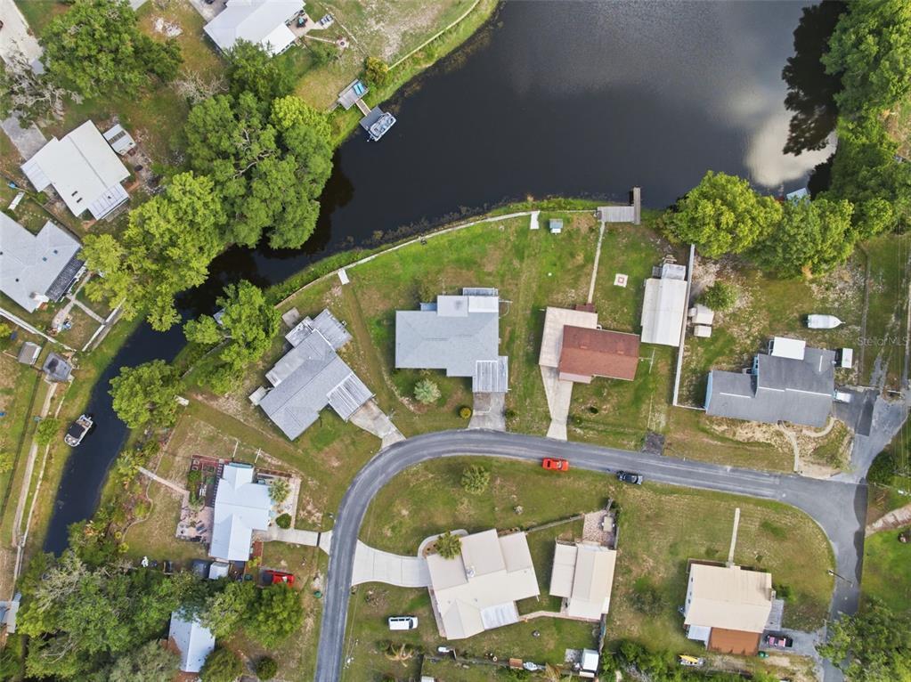 1830 South Mandarin Terrace Inverness, FL 34450 - Photo 31 of 47 an aerial view of a residential apartment building with a yard