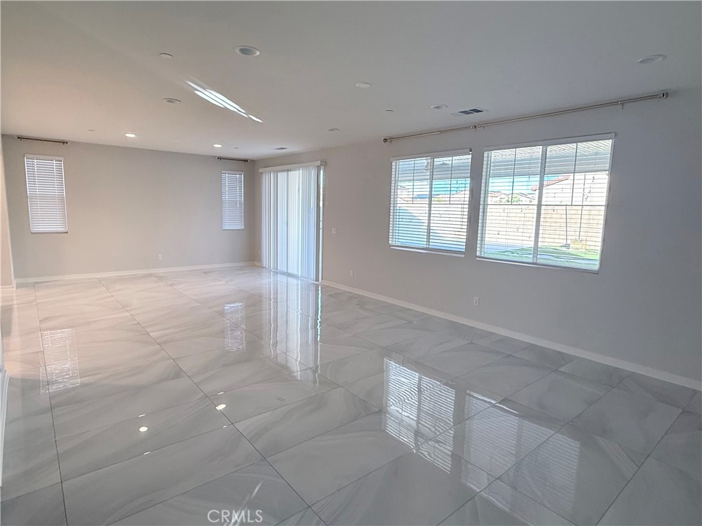 31124 Hanover Lane Menifee, CA 92584 - Photo 17 of 58 a view of an empty room with a window