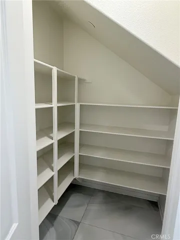 a view of a balcony with furniture