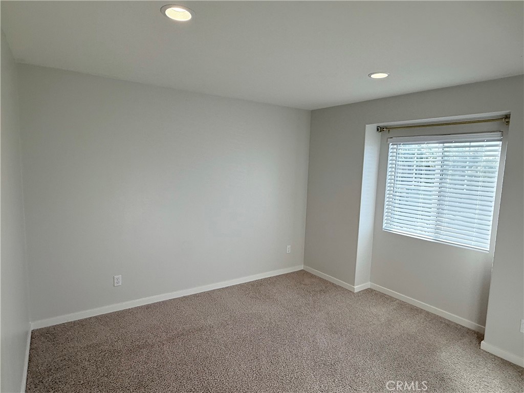 31124 Hanover Lane Menifee, CA 92584 - Photo 47 of 58 a view of an empty room with a window