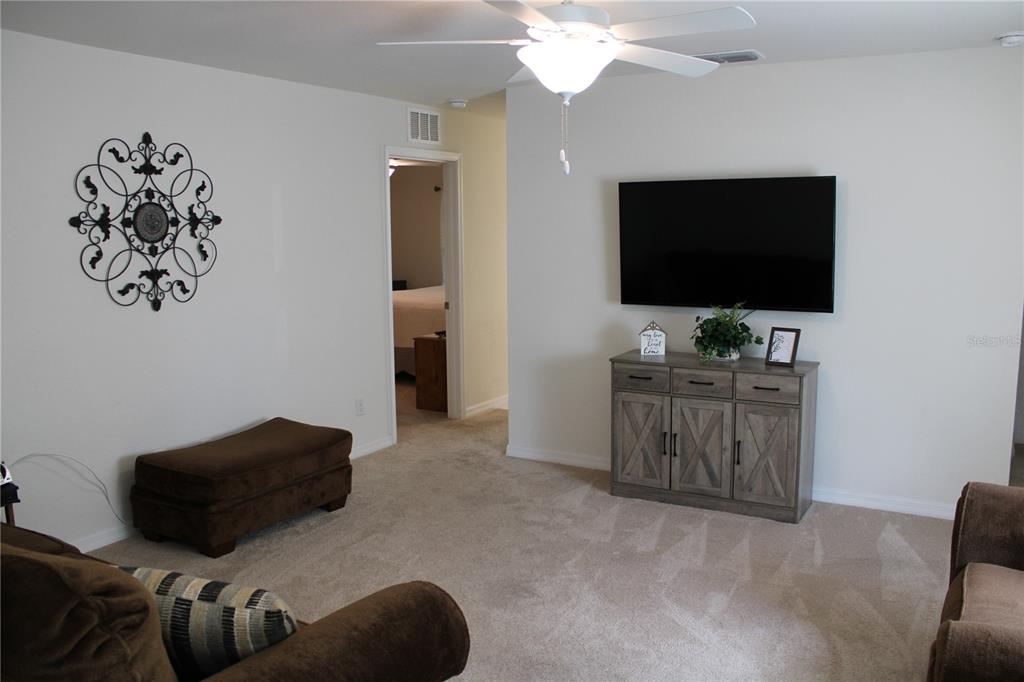 1300 Lucerne Loop Road Northeast Winter Haven, FL 33881 - Photo 6 of 40 Living Room.
