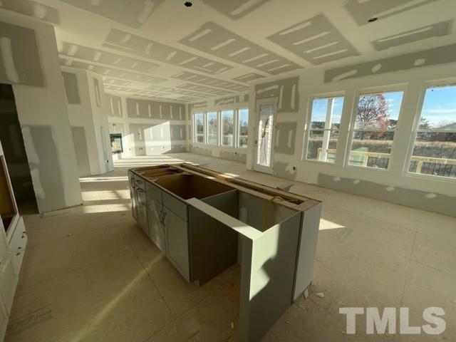 4429 Bridle Run Drive Raleigh, NC 27606 - Photo 9 of 14 a kitchen with stainless steel appliances granite countertop a sink and a granite counter tops