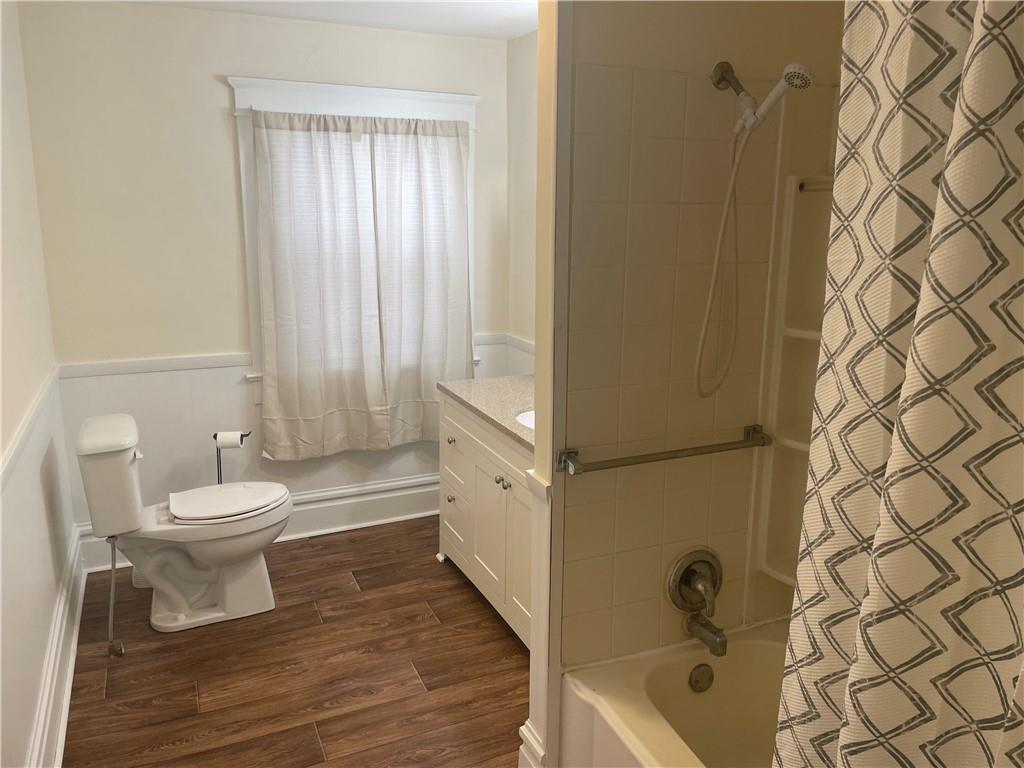 3821-3841 Evergreen Road New Bedford, PA 16143 - Photo 18 of 31 a bathroom with a toilet and a shower