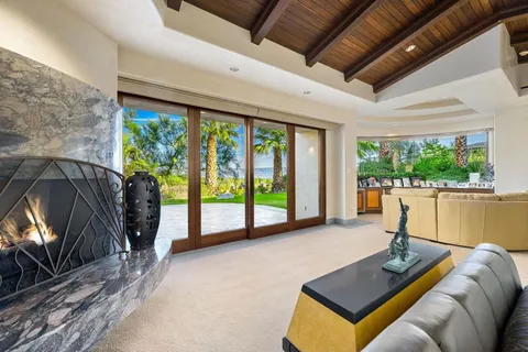 a view of a backyard with jacuzzi