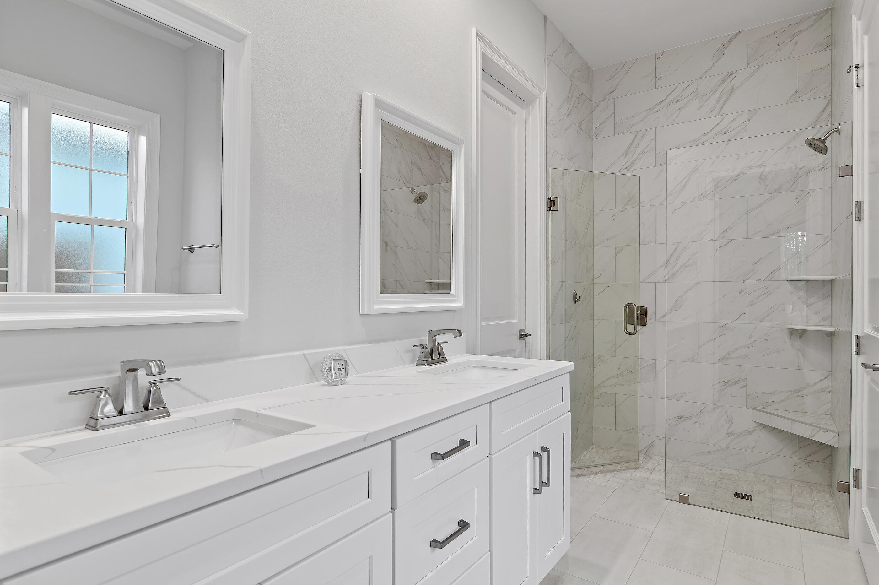 129 Suwannee Dr Inlet Beach Inlet Beach, FL 32461 - Photo 15 of 37 a bathroom with double sink and a mirror
