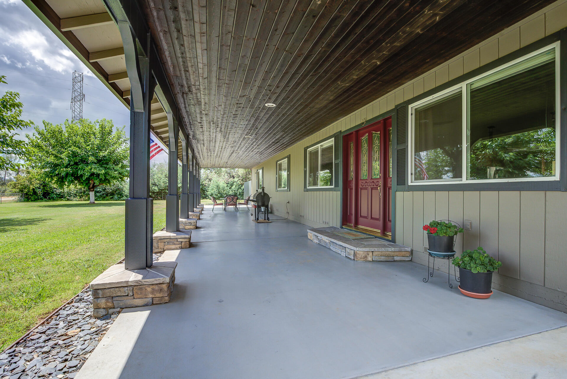 17536 Oly Way Anderson, CA 96007 - Photo 8 of 51 a view of a patio with chairs and potted plants