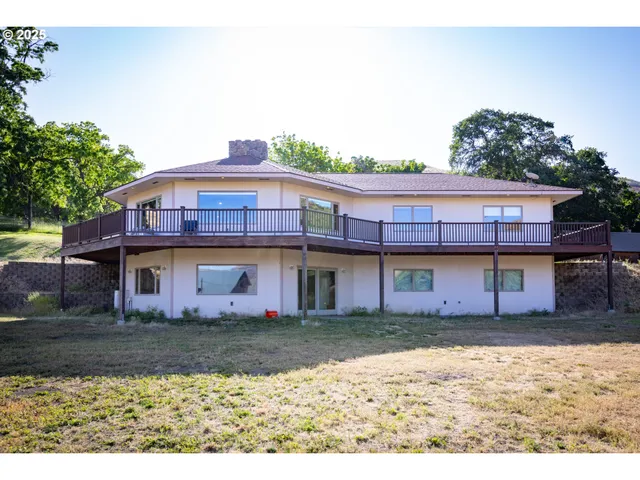 a view of a house with a street