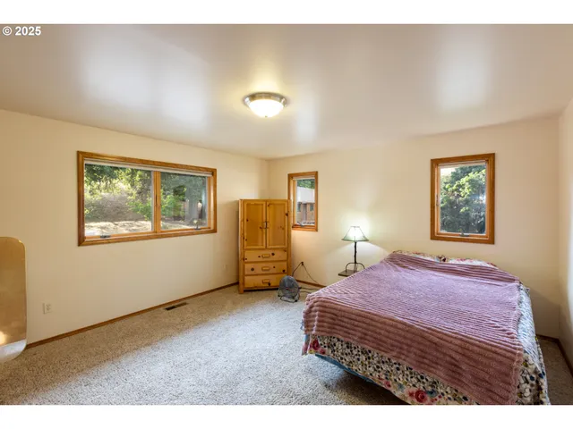 a bedroom with a bed