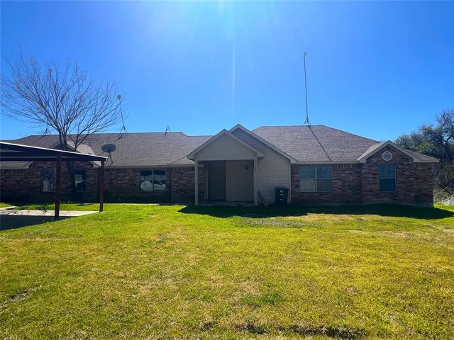 a house view with a outdoor space