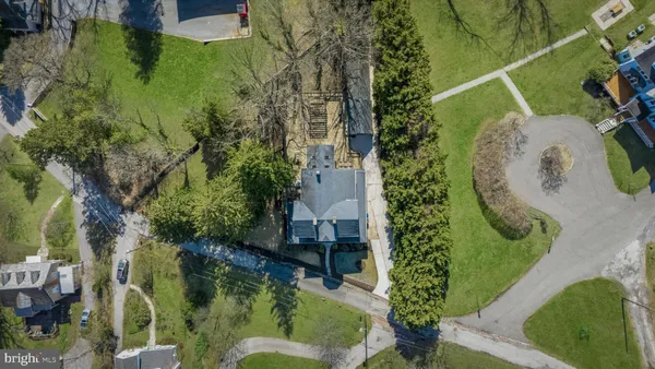 an aerial view of a swimming pool