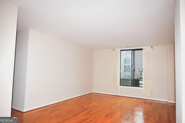 a view of an empty room with window