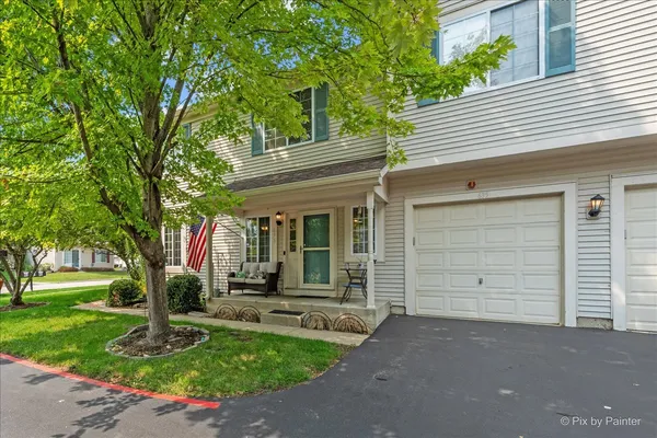 front view of a house with a garden