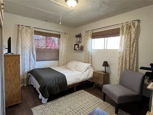 a bathroom with a shower and toilet