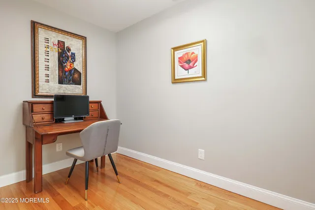 a kitchen with stainless steel appliances granite countertop a sink refrigerator stove and microwave