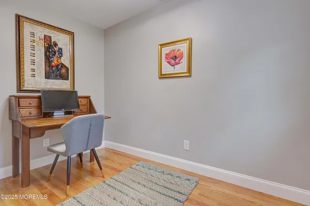 a workspace with furniture and lamp on desk