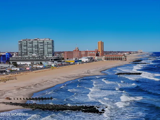a view of a balcony with table and chairs
