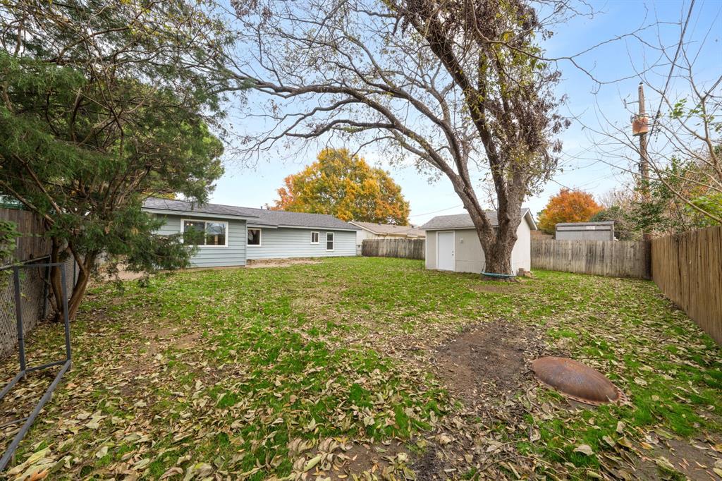 753 Cullum Avenue Hurst, TX 76053 - Photo 24 of 26 a view of a house with a large tree