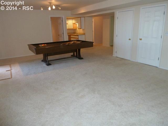 7625 Julynn Road Colorado Springs, CO 80919 - Photo 24 of 34 Family Room includes a wet bar