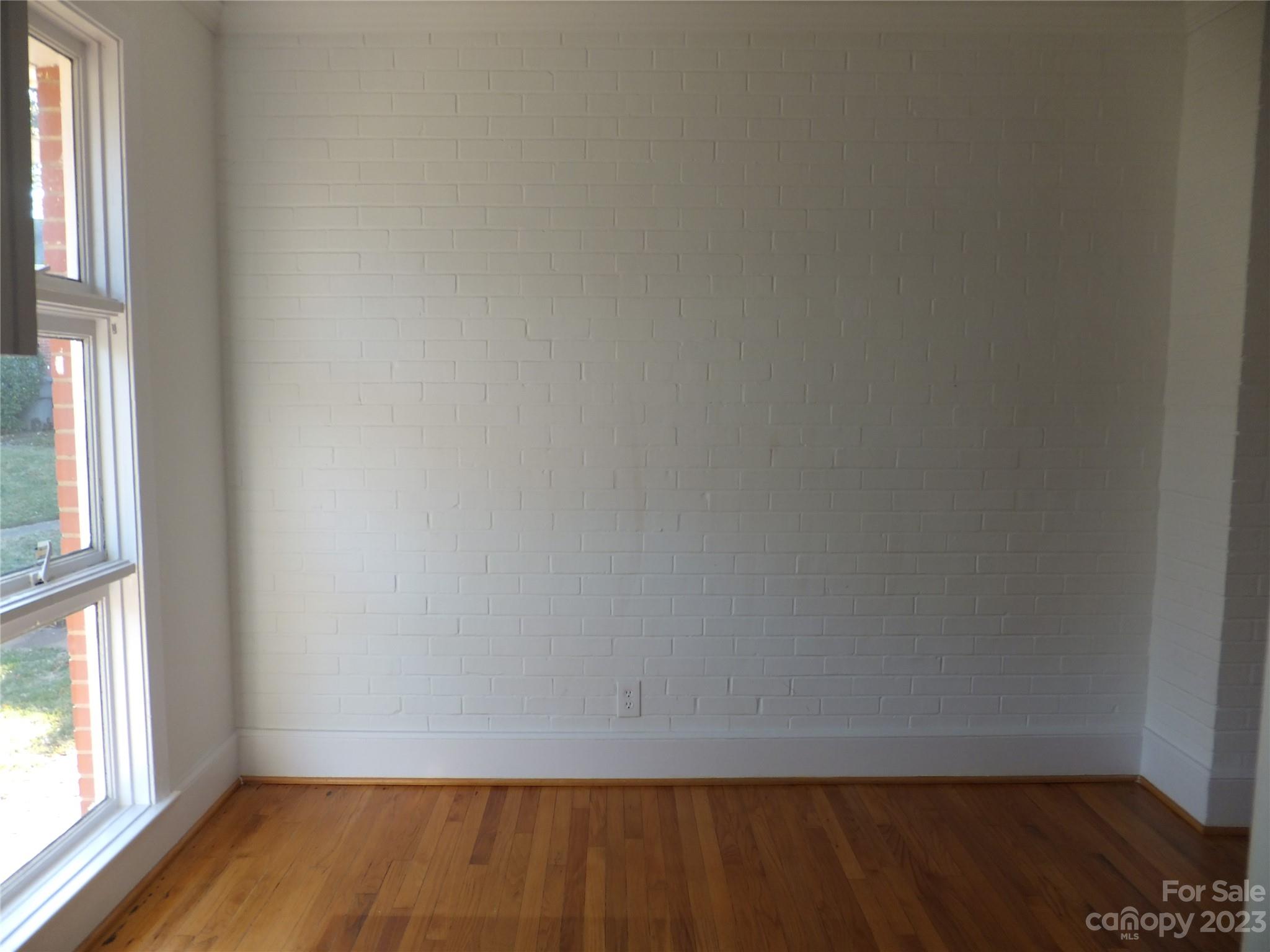 4222 Randolph Road Charlotte, NC 28211 - Photo 12 of 18 a view of an empty room and wooden floor