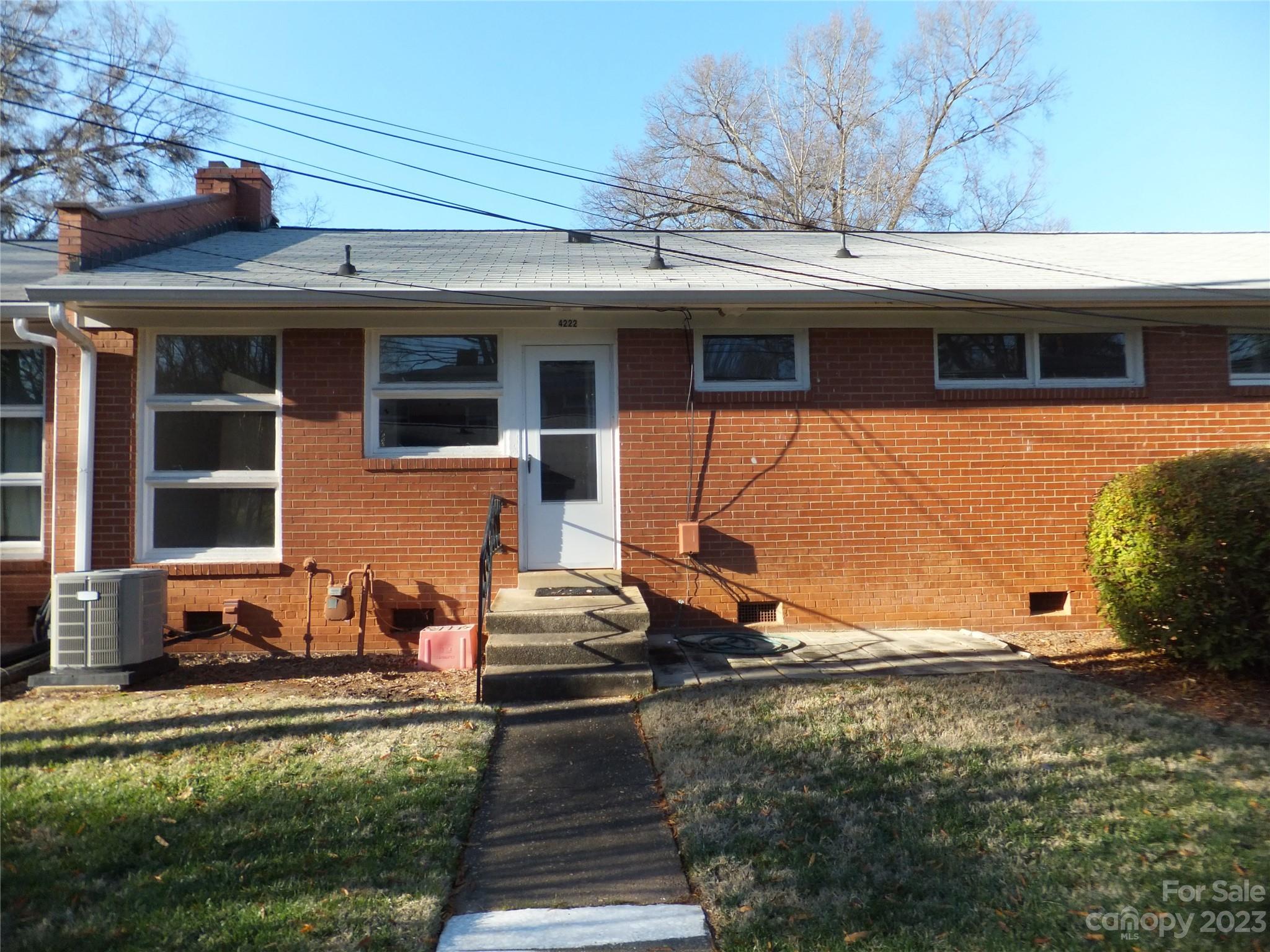 4222 Randolph Road Charlotte, NC 28211 - Photo 18 of 18 a view of a house with backyard and sitting area