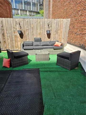 a balcony view with an outdoor space