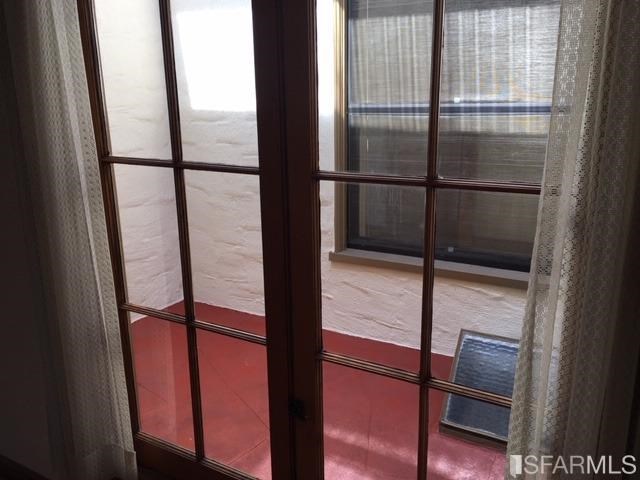 22 Shawnee Avenue San Francisco, CA 94112 - Photo 18 of 21 a bathroom with a glass shower door