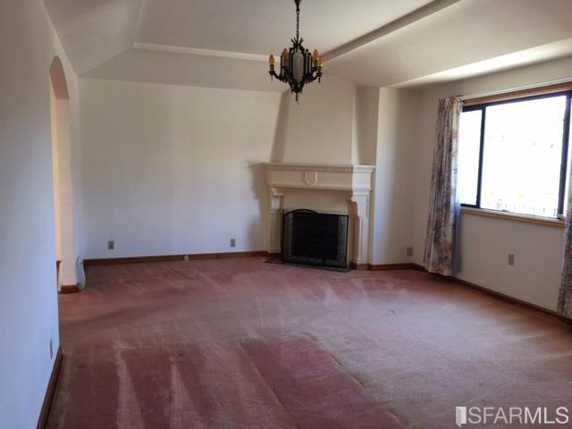 22 Shawnee Avenue San Francisco, CA 94112 - Photo 3 of 21 a view of empty room with fireplace