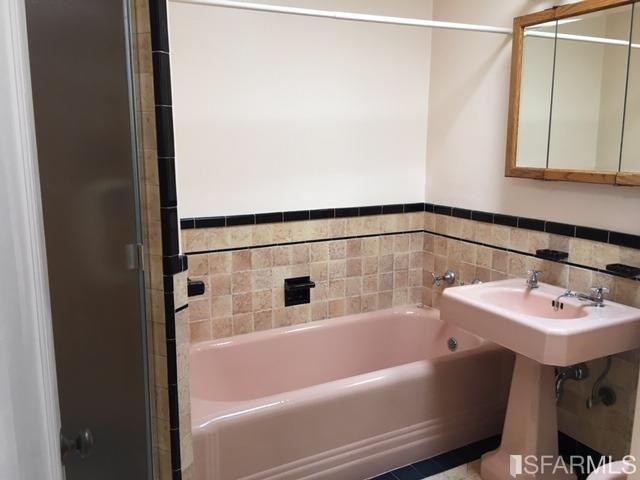 22 Shawnee Avenue San Francisco, CA 94112 - Photo 10 of 21 a bathroom with a bathtub and a sink