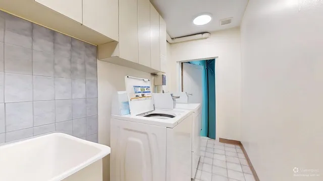 a bathroom with a sink a vanity and a mirror