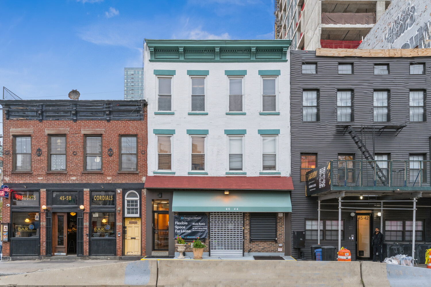 a view of a building with a street