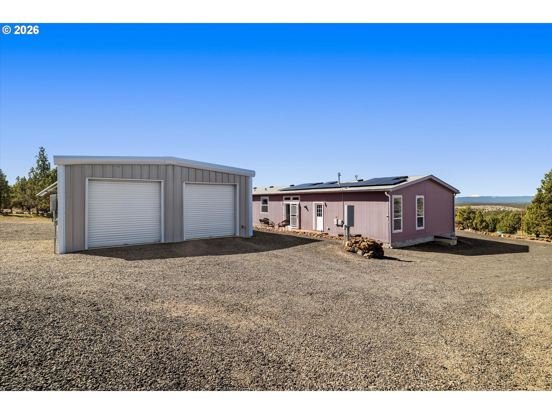 5172 Southeast Oswego Road Prineville, OR 97754 - Photo 42 of 48 a view of a house with a patio