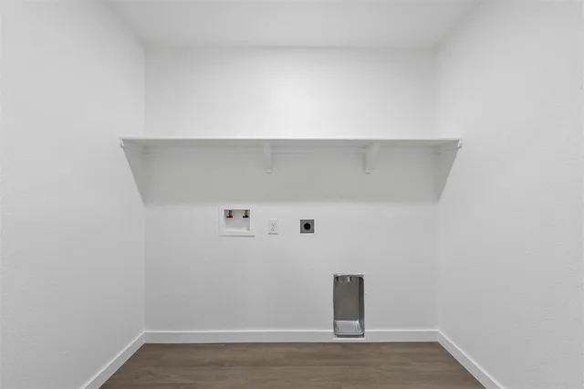 a view of a small space with wooden floor